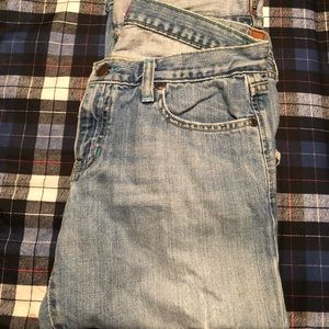 Abercrombie and Fitch destroyed jeans.